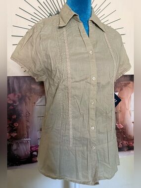 DCC Garment with light shade of green in large.